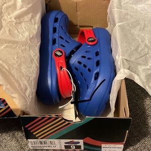 Sketcher croc style slides / sandals